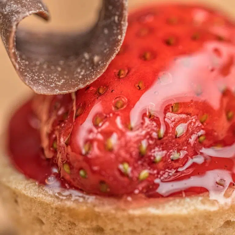 Close up Food Photography - glaze on strawberry