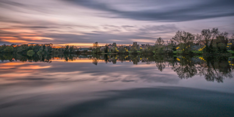 UEA Broad reflections at sunset smoothed by a long exposure
