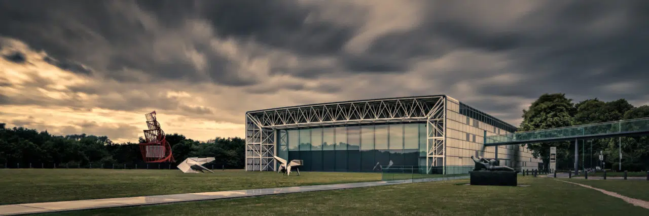 University of East Anglia Sainsbury Centre for Visual Arts with a dramatic sky at sunset