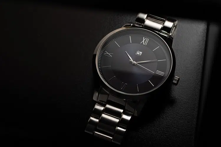 Watch photography evoking luxury with sophisticated lighting on mens watch