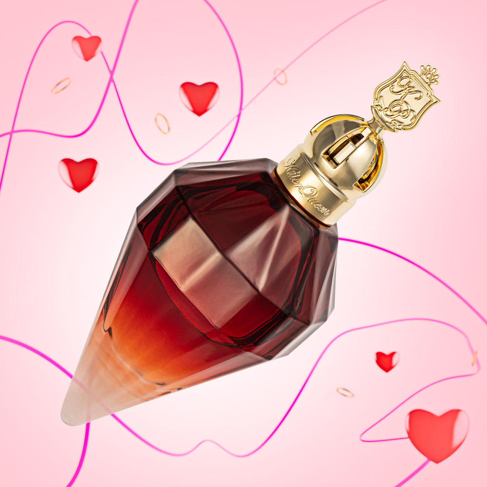 Perfume advertising photography sample - Killer Queen styled for Valentines with hearts & pink background